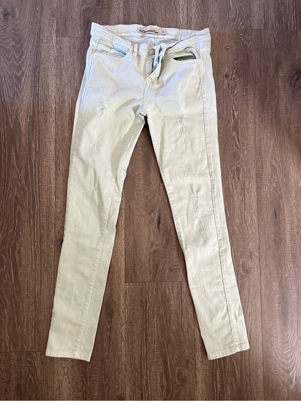 Women's Skinny Jeans in Light Sage with Subtle Distressing